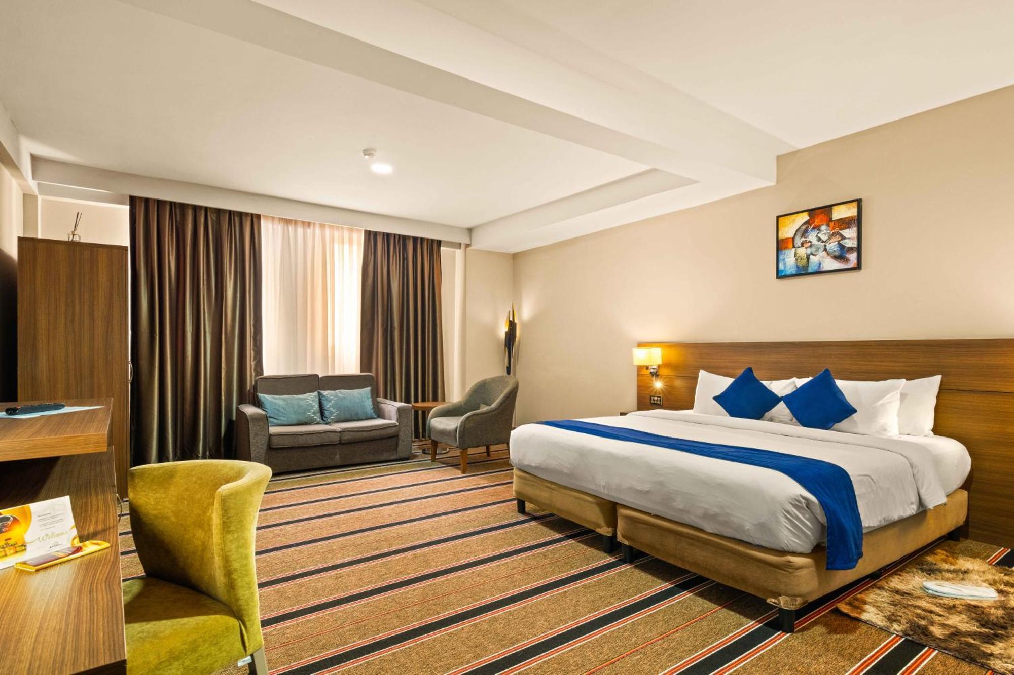 Ah Hotel And Conferences Madina Esterno foto