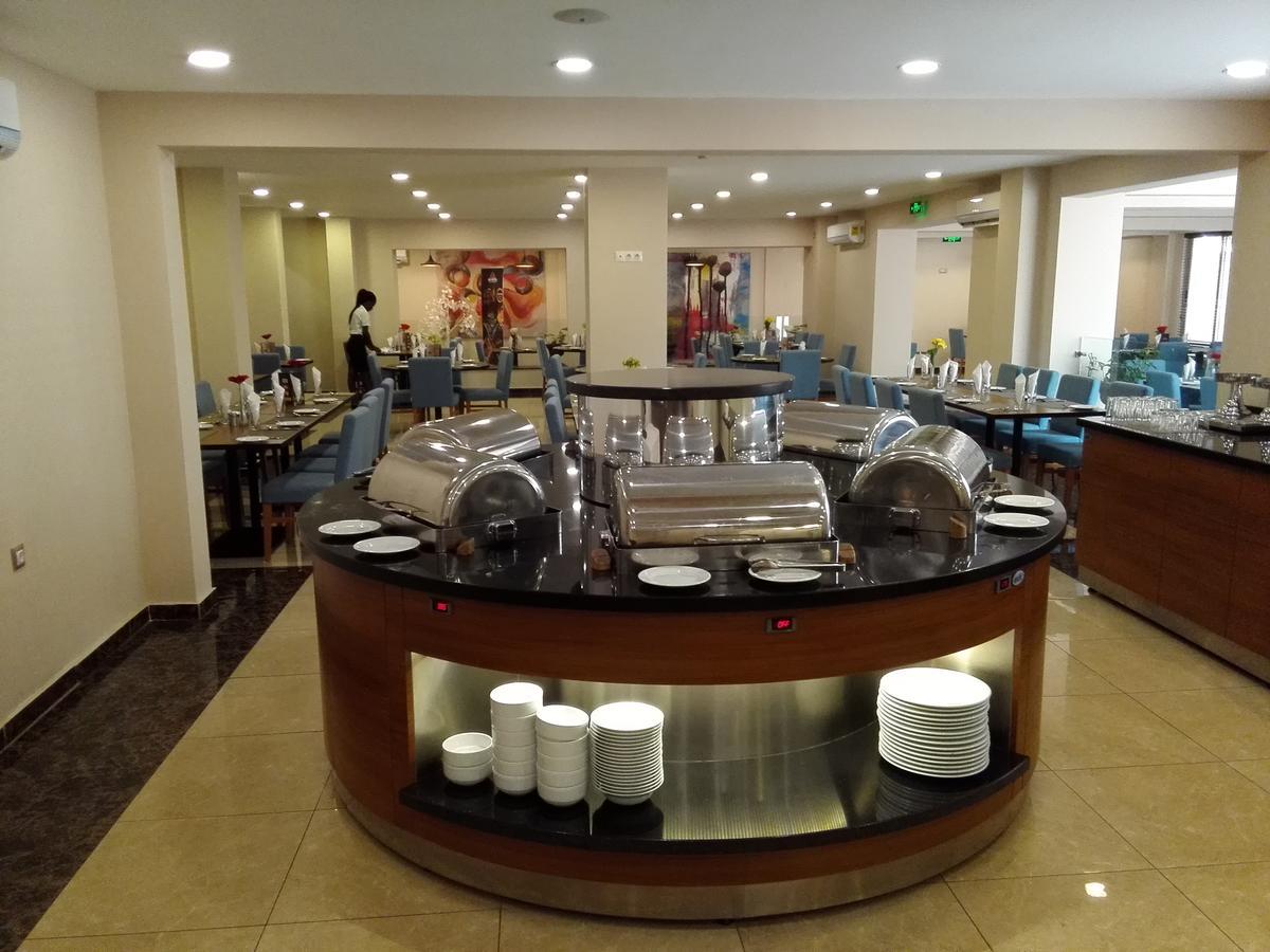 Ah Hotel And Conferences Madina Esterno foto